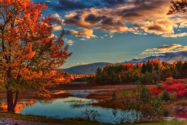 a sunset over a body of water